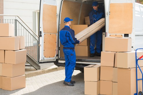 Man And Van Manorhouse pricing explained with moving boxes and van load estimate