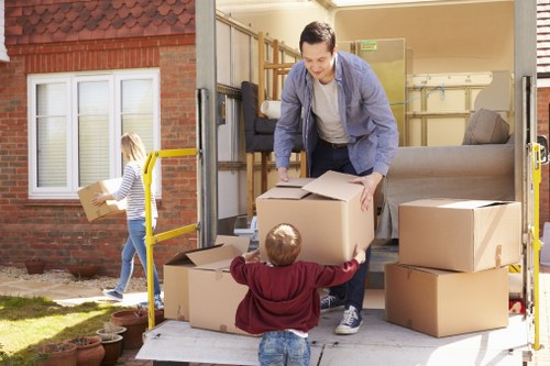 Professional house removalists loading furniture in Manorhouse