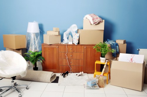 Moving team handling furniture removals in Manorhouse