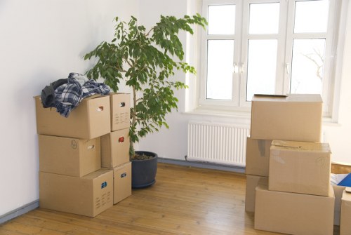 Packed moving boxes prepared for a house move in Manorhouse
