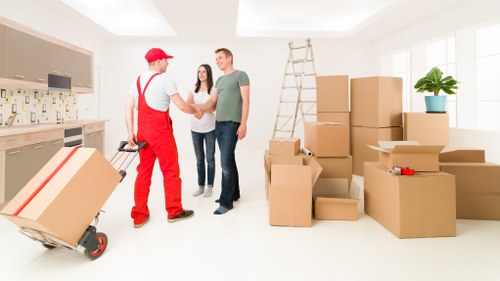 Careful handling of bulky items by a local moving team in Manor House