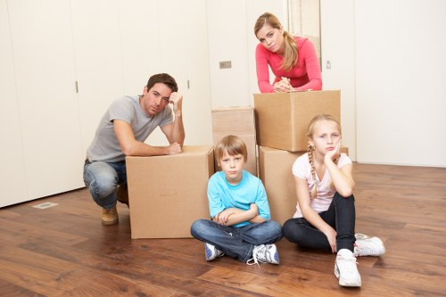 Careful packing and loading for house removals in Manorhouse